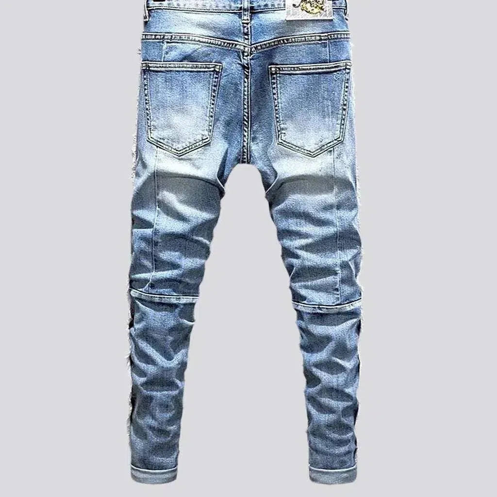 Distressed men's sanded jeans